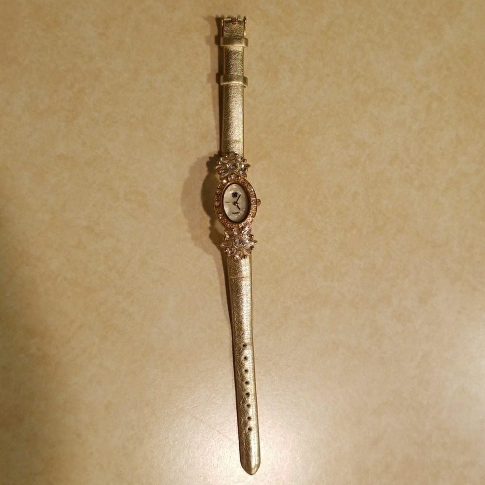 Elizabeth Taylor White Diamonds Gold Toned Watch